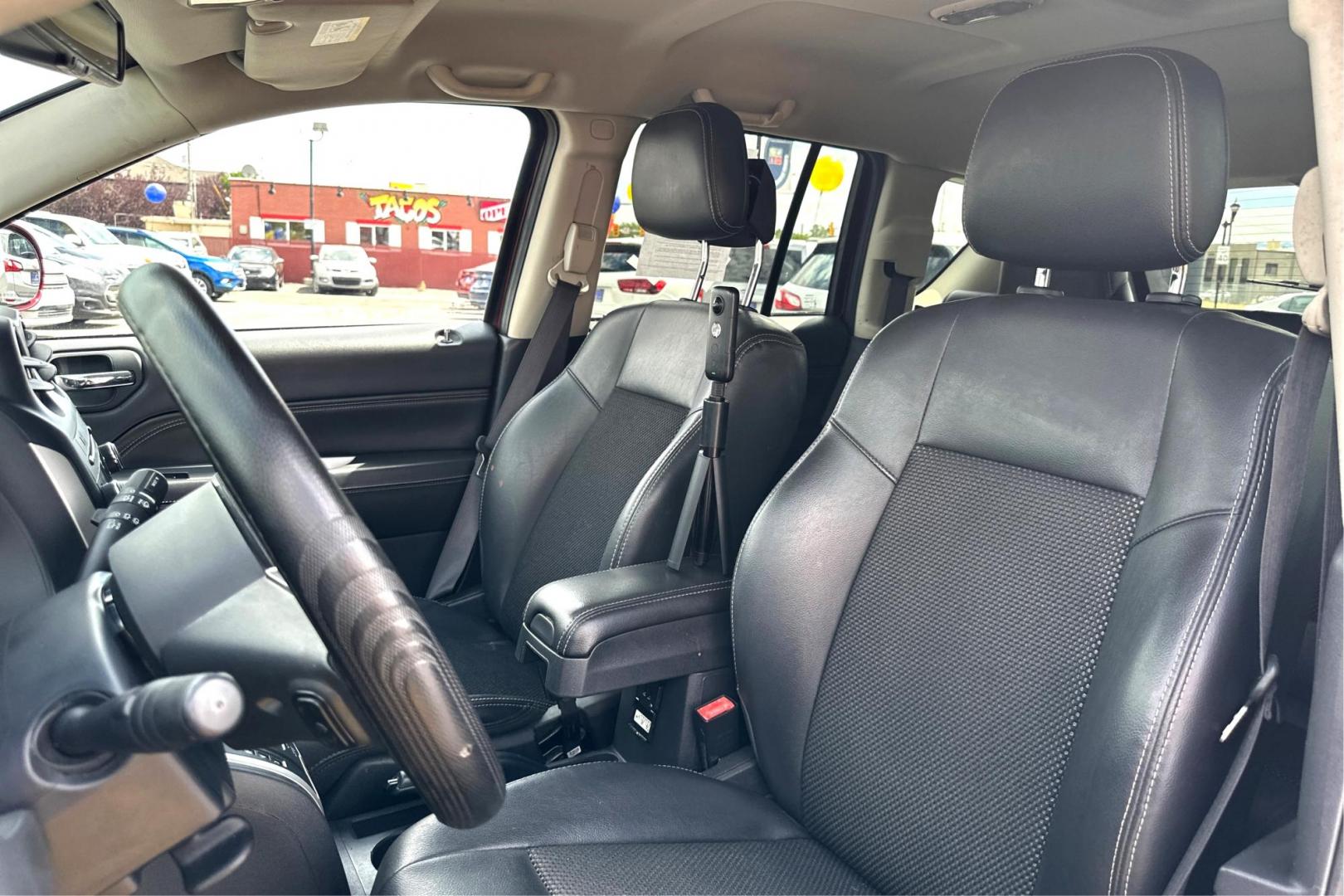 2017 Red Jeep Compass Latitude FWD (1C4NJCEB3HD) with an 2.4L L4 DOHC 16V engine, CVT transmission, located at 7755 State Street, Midvale, UT, 84047, (801) 753-9063, 40.610329, -111.890656 - Photo#11