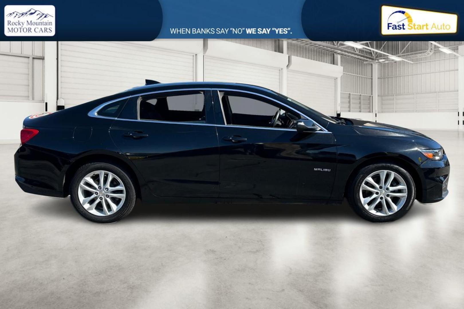 2018 Black Chevrolet Malibu LT (1G1ZD5ST5JF) with an 1.5L L4 DOHC 16V engine, 6A transmission, located at 344 S Washington Blvd, Ogden, UT, 84404, (801) 399-1799, 41.255482, -111.970848 - Photo#1