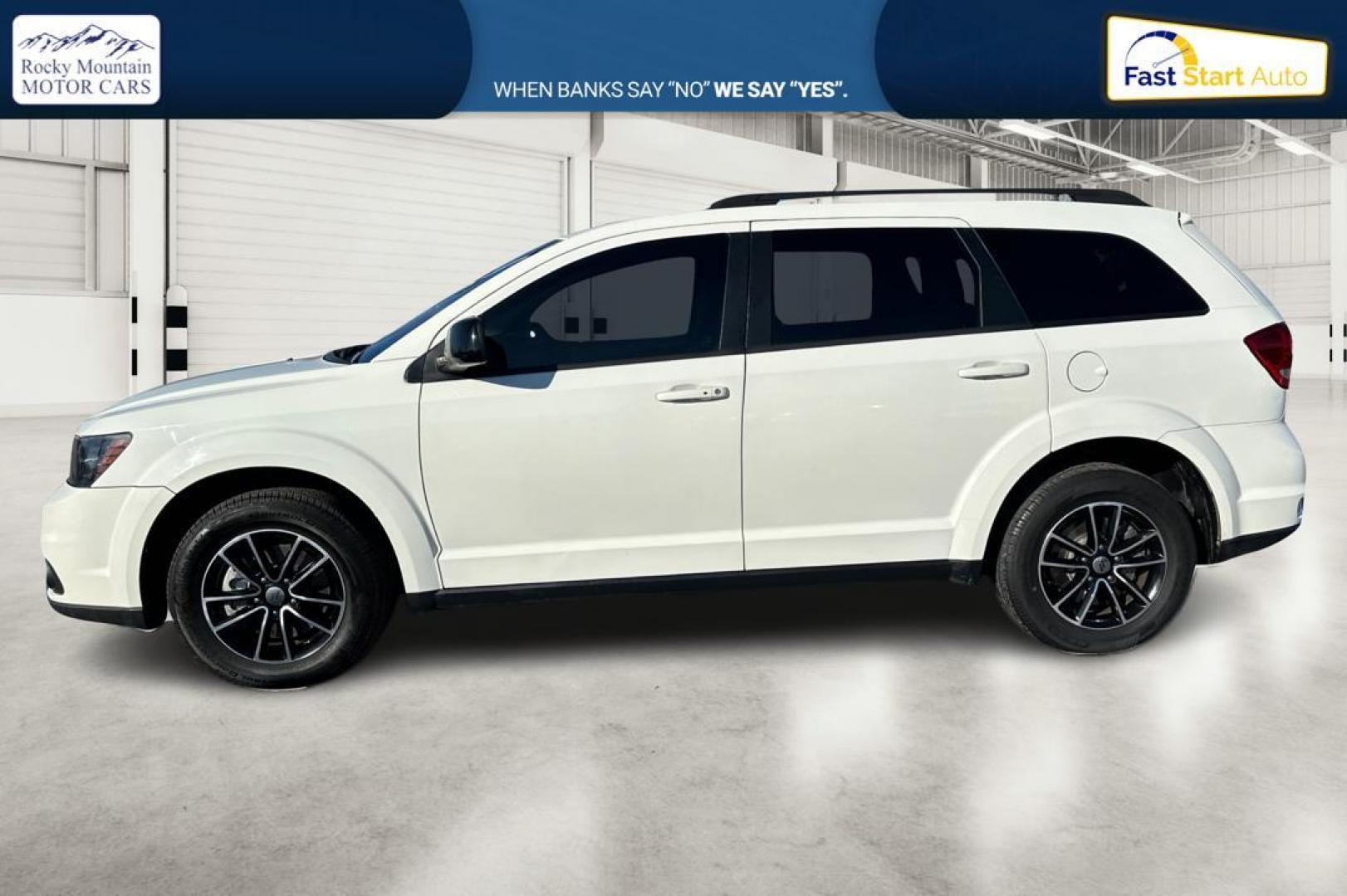 2018 White Dodge Journey SXT (3C4PDCBG9JT) with an 3.6L V6 DOHC 24V engine, 4A transmission, located at 7755 State Street, Midvale, UT, 84047, (801) 753-9063, 40.610329, -111.890656 - Photo#6