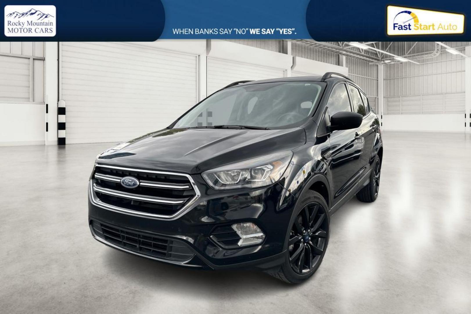 2018 Black Ford Escape SE FWD (1FMCU0GD9JU) with an 1.5L L4 DOHC 16V engine, 6A transmission, located at 7755 State Street, Midvale, UT, 84047, (801) 753-9063, 40.610329, -111.890656 - Photo#6