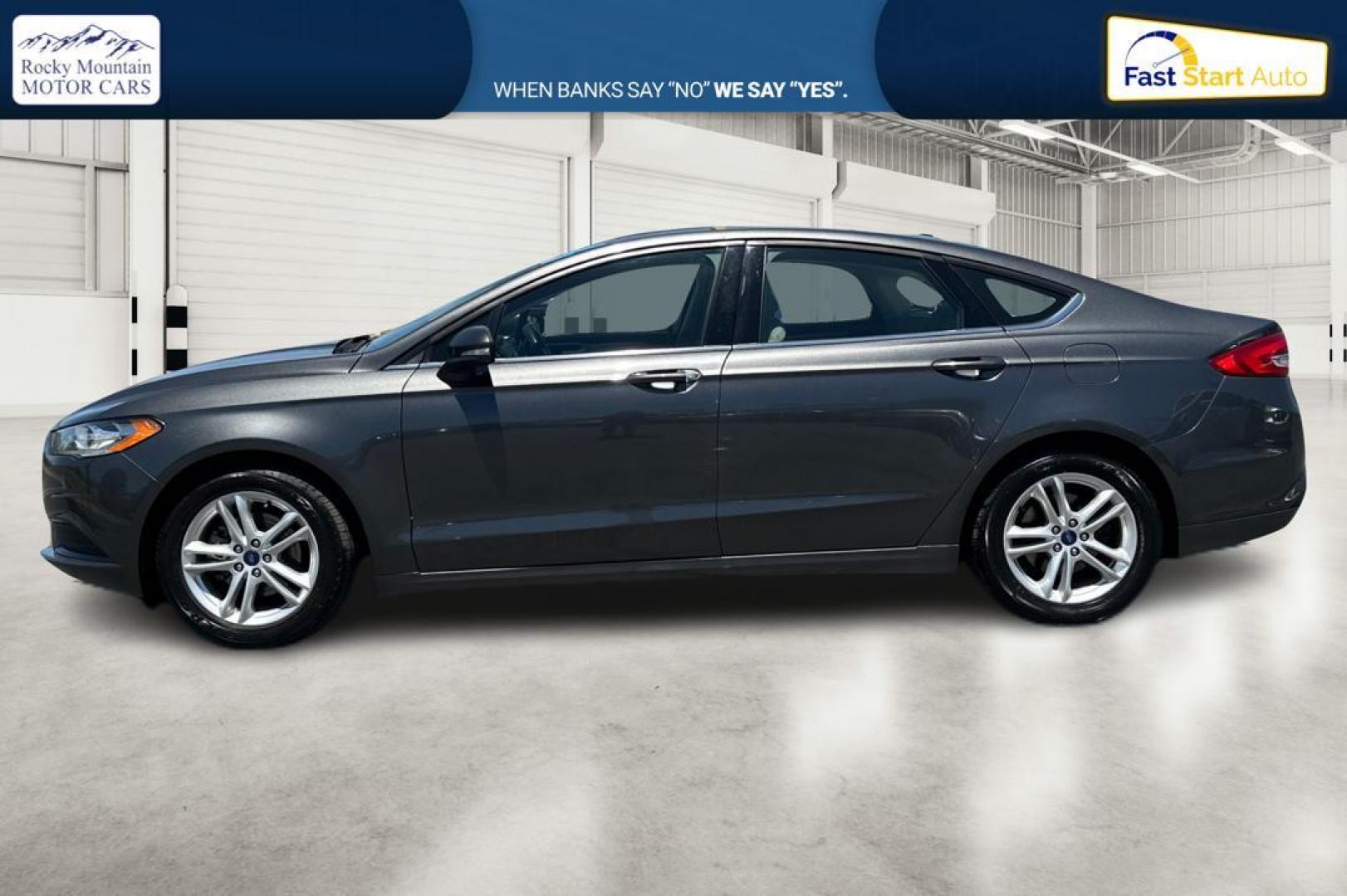 2018 Gray Ford Fusion SE (3FA6P0HD7JR) with an 1.5L L4 DOHC 16V engine, 6A transmission, located at 7755 State Street, Midvale, UT, 84047, (801) 753-9063, 40.610329, -111.890656 - Photo#5