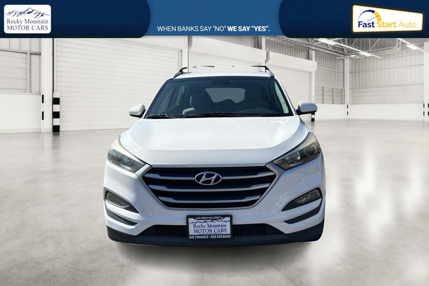 2018 White Hyundai Tucson SE (KM8J33A46JU) with an 2.0L L4 DOHC 16V engine, 6A transmission, located at 344 S Washington Blvd, Ogden, UT, 84404, (801) 399-1799, 41.255482, -111.970848 - Photo#9