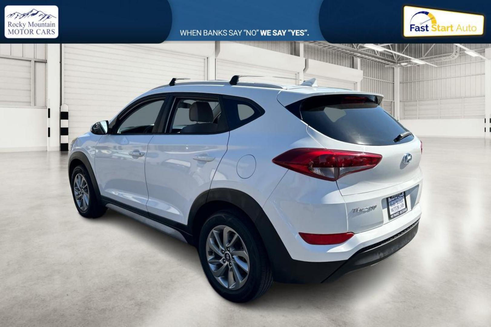 2018 White Hyundai Tucson SE (KM8J33A46JU) with an 2.0L L4 DOHC 16V engine, 6A transmission, located at 344 S Washington Blvd, Ogden, UT, 84404, (801) 399-1799, 41.255482, -111.970848 - Photo#5