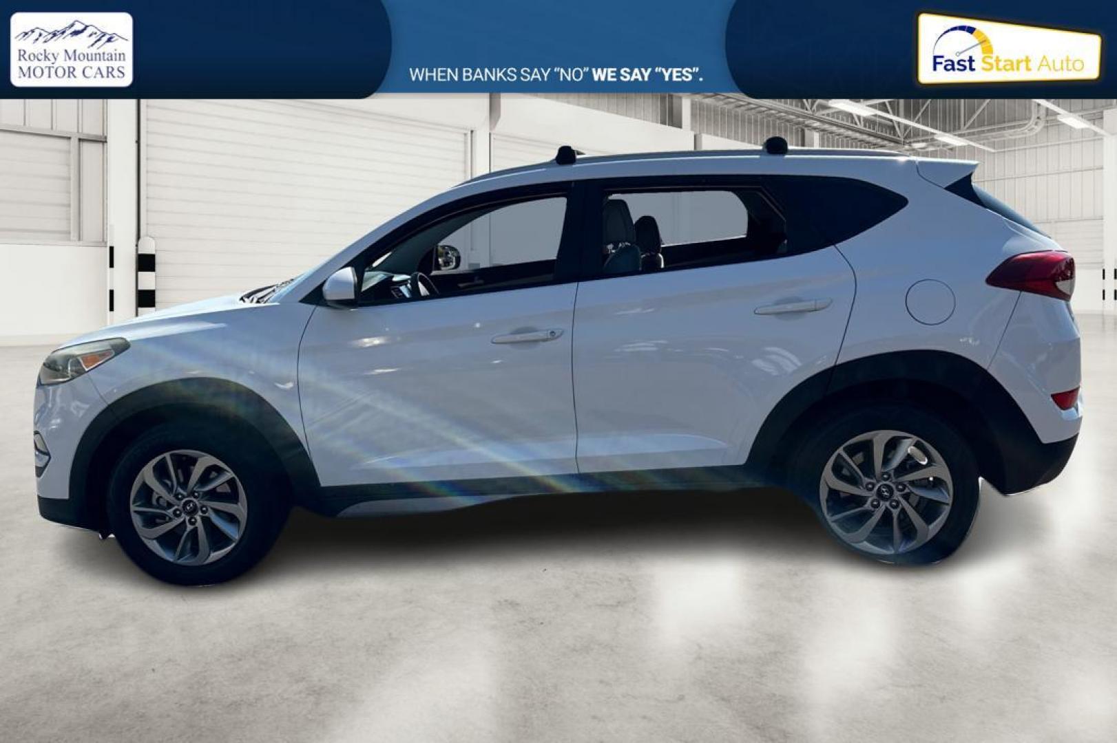 2018 White Hyundai Tucson SE (KM8J33A46JU) with an 2.0L L4 DOHC 16V engine, 6A transmission, located at 344 S Washington Blvd, Ogden, UT, 84404, (801) 399-1799, 41.255482, -111.970848 - Photo#6