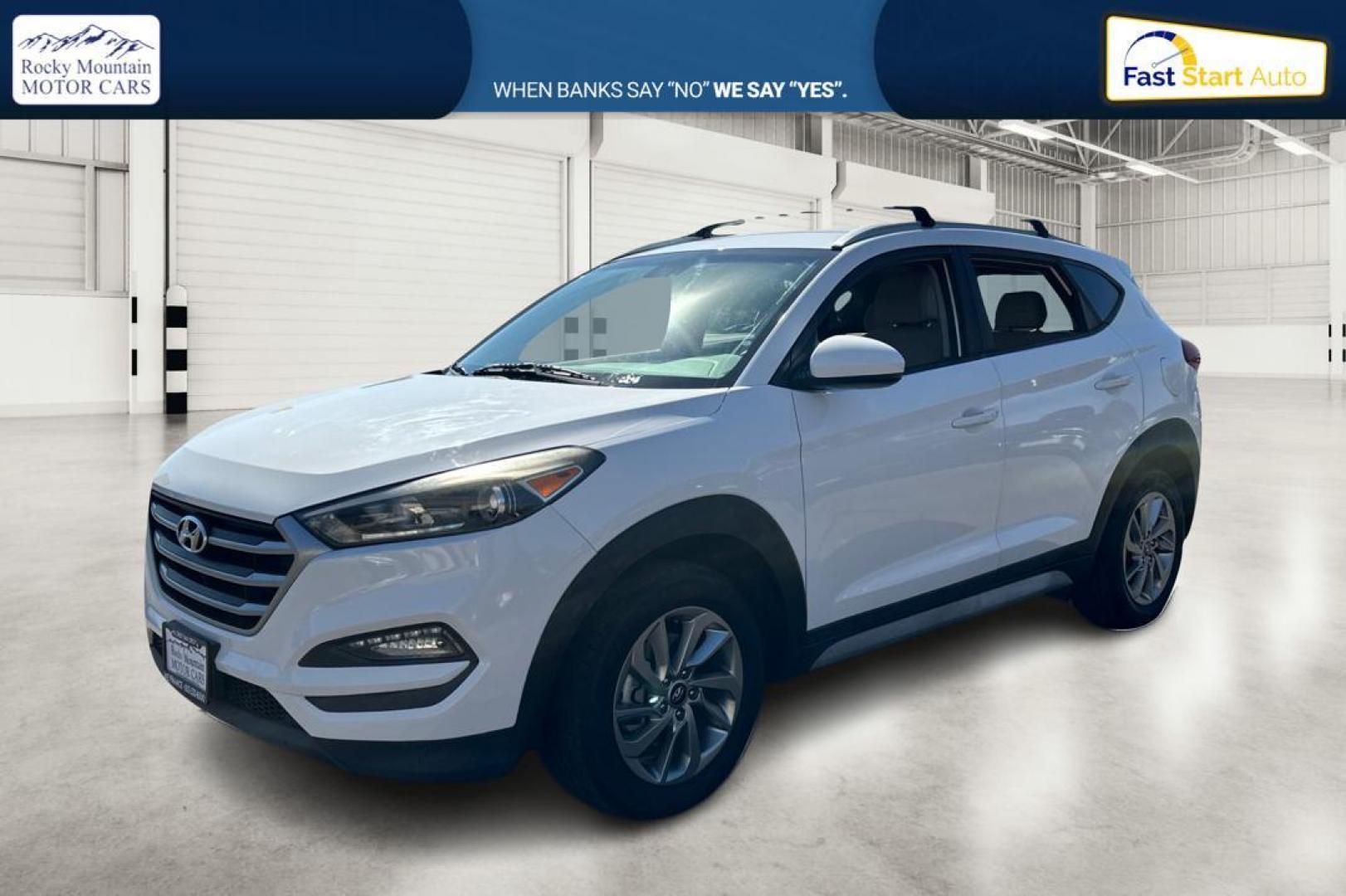 2018 White Hyundai Tucson SE (KM8J33A46JU) with an 2.0L L4 DOHC 16V engine, 6A transmission, located at 344 S Washington Blvd, Ogden, UT, 84404, (801) 399-1799, 41.255482, -111.970848 - Photo#8