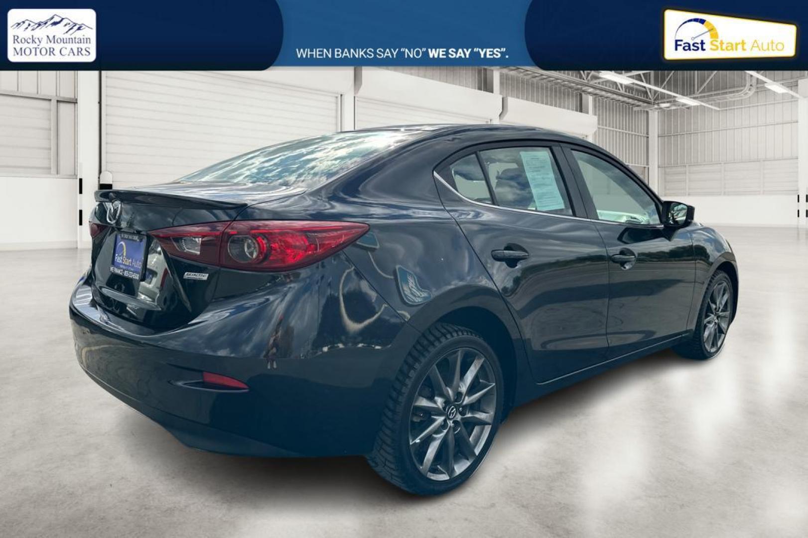 2018 Black Mazda MAZDA3 s Touring AT 4-Door (3MZBN1V30JM) with an 2.5L L4 DOHC 16V engine, 6A transmission, located at 7755 State Street, Midvale, UT, 84047, (801) 753-9063, 40.610329, -111.890656 - Photo#2