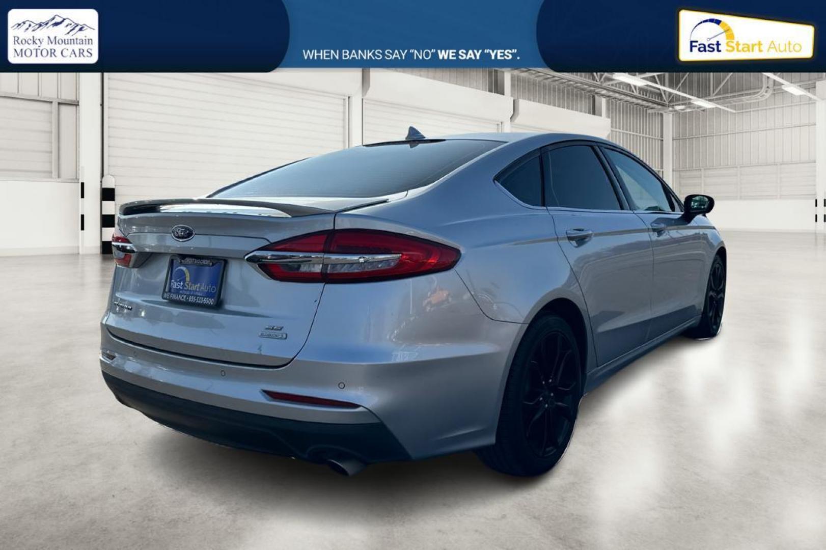 2019 Silver Ford Fusion SE (3FA6P0HD0KR) with an 1.5L L4 DOHC 16V engine, 6A transmission, located at 7755 State Street, Midvale, UT, 84047, (801) 753-9063, 40.610329, -111.890656 - Photo#2