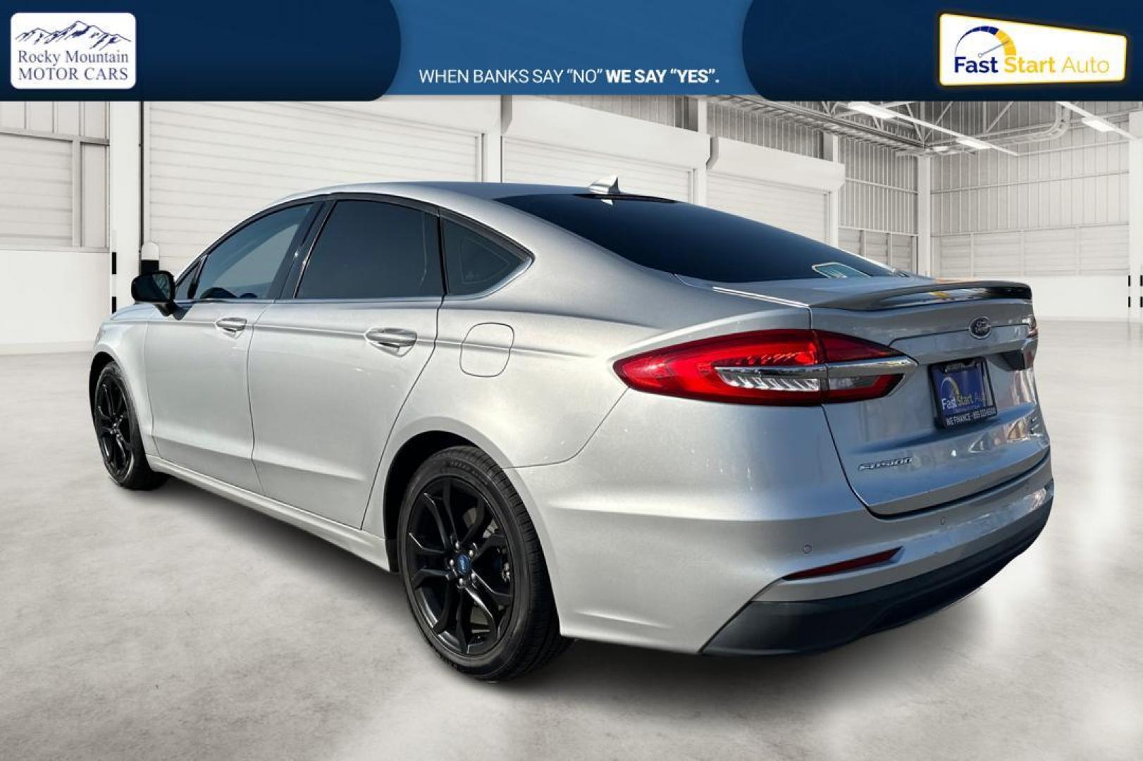 2019 Silver Ford Fusion SE (3FA6P0HD0KR) with an 1.5L L4 DOHC 16V engine, 6A transmission, located at 7755 State Street, Midvale, UT, 84047, (801) 753-9063, 40.610329, -111.890656 - Photo#5