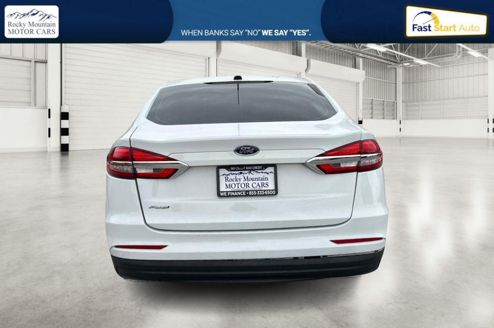 2019 White Ford Fusion S (3FA6P0G70KR) with an 2.5L L4 DOHC 16V engine, 6A transmission, located at 767 S State Road, Pleasant Grove, UT, 84062, (801) 785-1058, 40.354839, -111.736687 - Photo#4