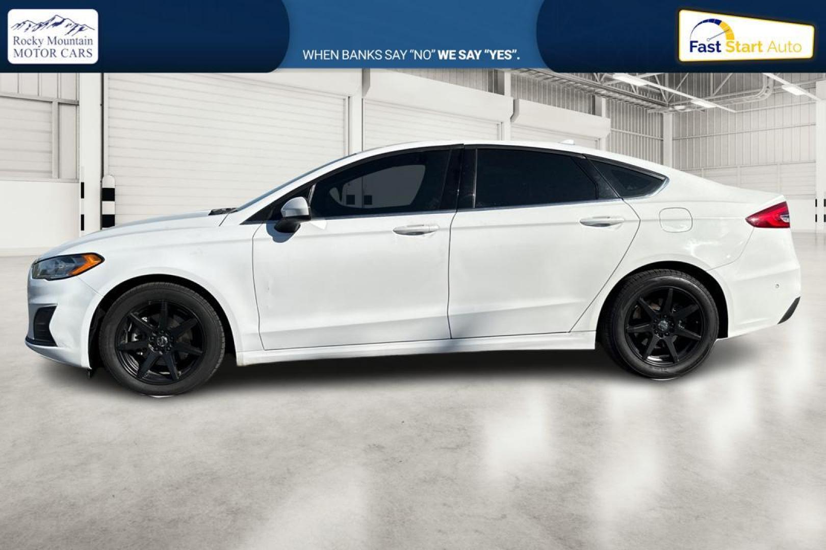 2019 White Ford Fusion SE (3FA6P0HD1KR) with an 1.5L L4 DOHC 16V engine, 6A transmission, located at 7755 State Street, Midvale, UT, 84047, (801) 753-9063, 40.610329, -111.890656 - Photo#6