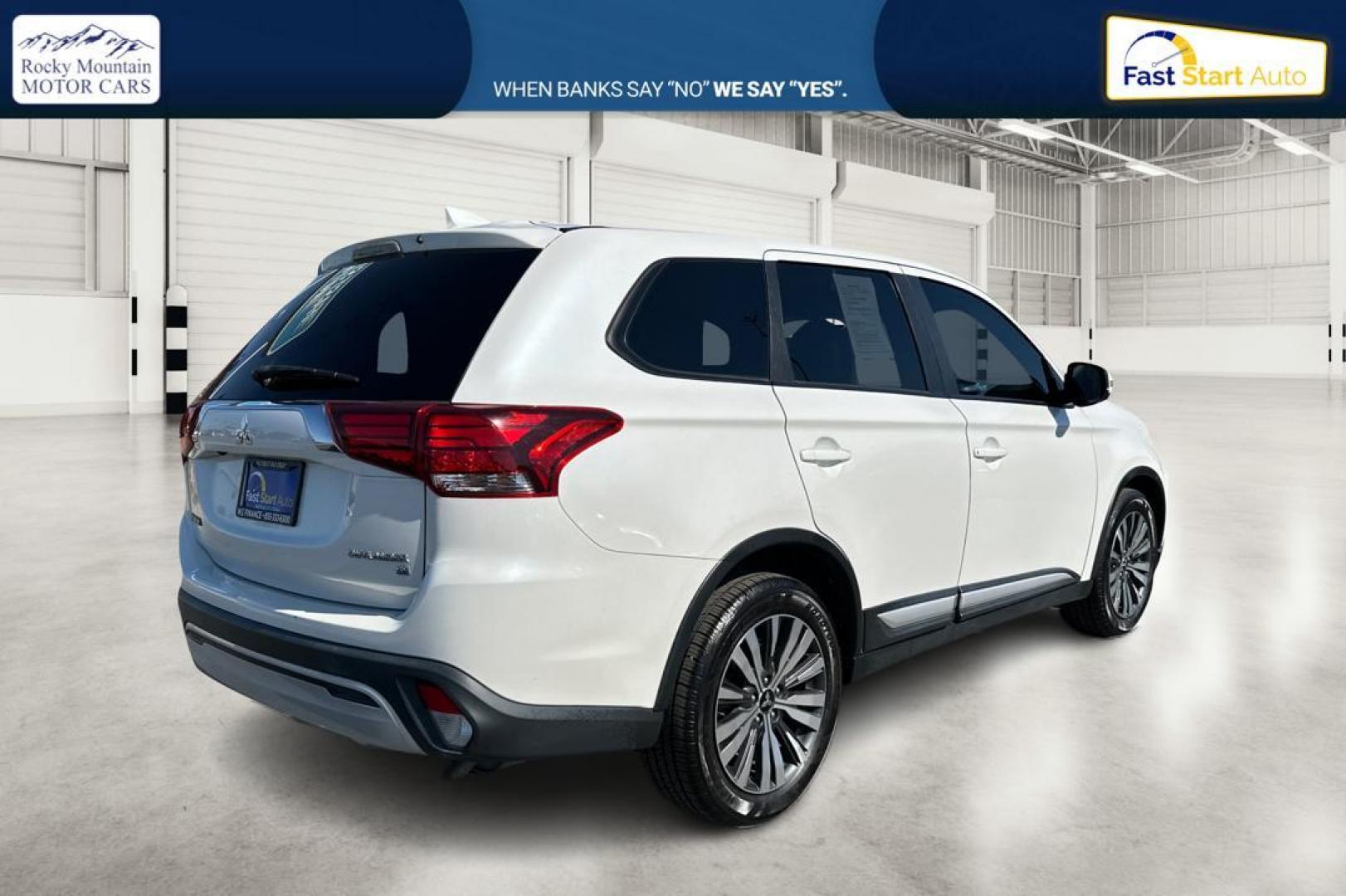 2019 White Mitsubishi Outlander SEL AWD (JA4AZ3A33KZ) with an 2.4L L4 DOHC 16V engine, CVT transmission, located at 7755 State Street, Midvale, UT, 84047, (801) 753-9063, 40.610329, -111.890656 - Photo#2