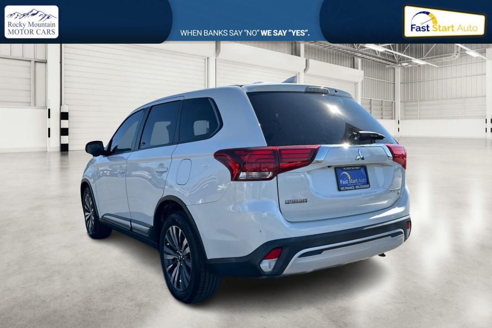 2019 White Mitsubishi Outlander SEL AWD (JA4AZ3A33KZ) with an 2.4L L4 DOHC 16V engine, CVT transmission, located at 7755 State Street, Midvale, UT, 84047, (801) 753-9063, 40.610329, -111.890656 - Photo#4